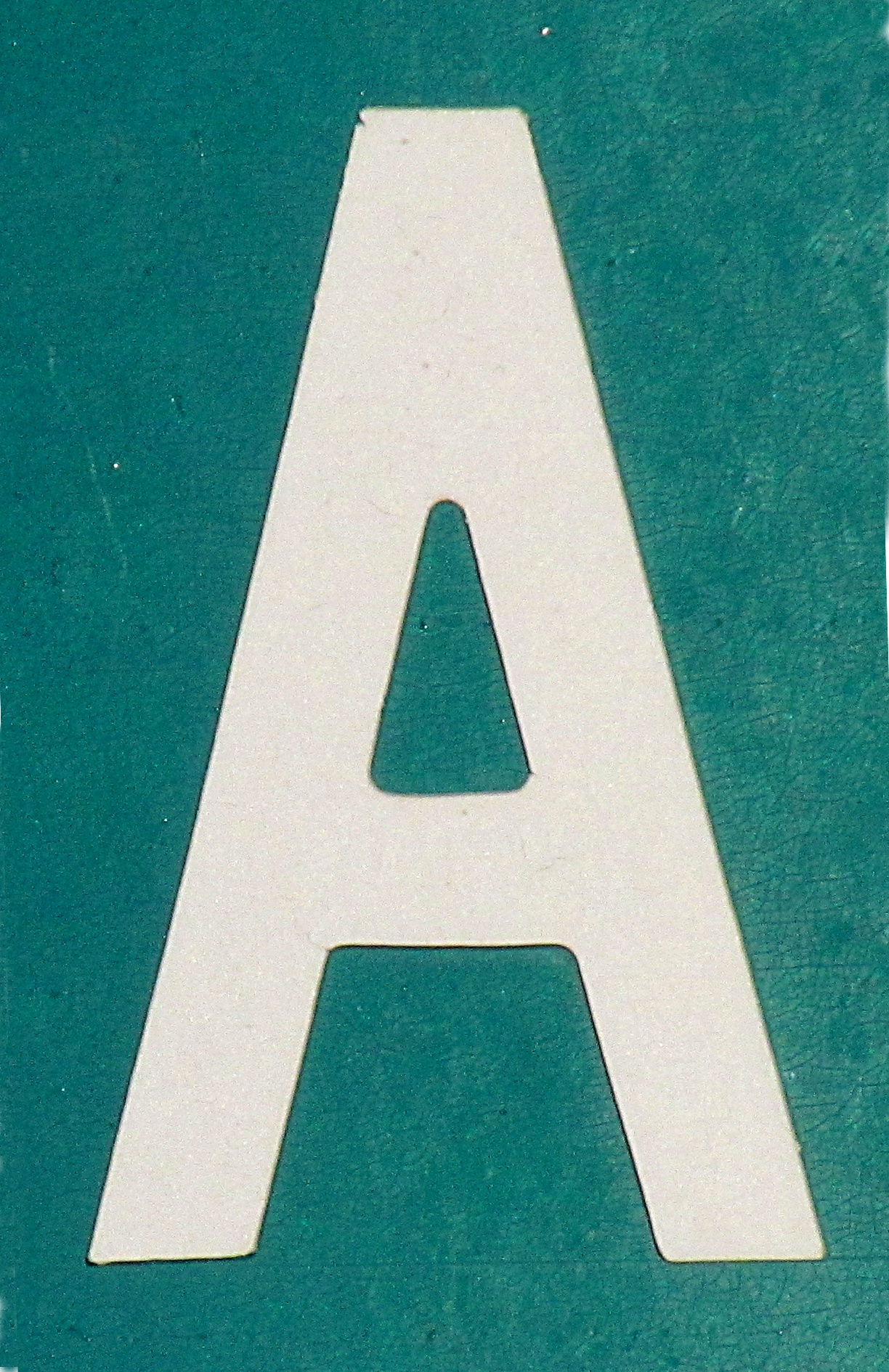 "A" from a street sign